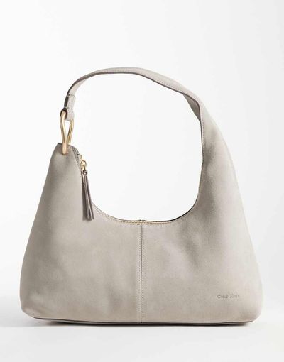 Calvin Klein Calvin Klein premium suede slouchy shoulder bag with gold trim in beige-Gray