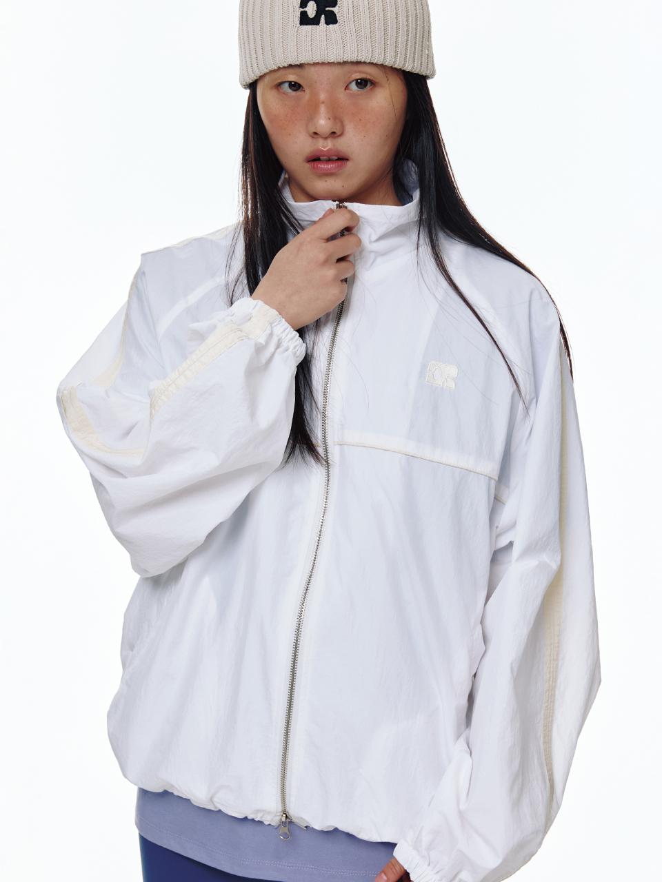 CENTAUR.KR NYLON WINDBREAKER JACKET [IVORY]