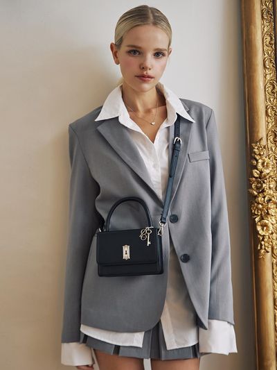 CLE CELESTE Belier handle bag black