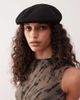 Collusion COLLUSION branded flap cap in black - 1