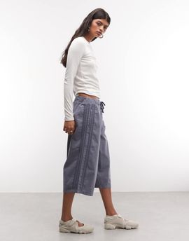 Collusion COLLUSION denim baggy track shorts in mid blue wash