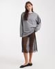 Collusion COLLUSION polka dot sheer mesh awkward length skirt in black - 1