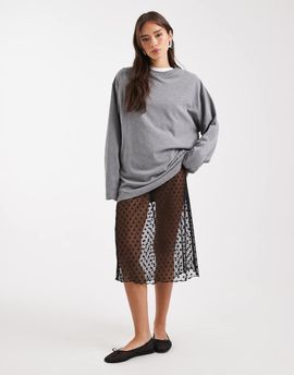 Collusion COLLUSION polka dot sheer mesh awkward length skirt in black