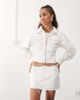 Collusion COLLUSION raw hem denim mini skirt in ecru-Neutral - 3
