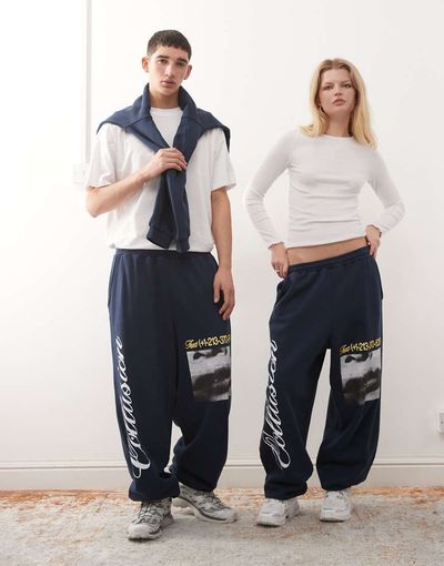 Collusion COLLUSION Unisex baggy relaxed cuff sweatpants in blue with prints-Navy