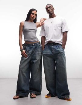 Collusion COLLUSION Unisex XL baggy jeans in mid blue wash
