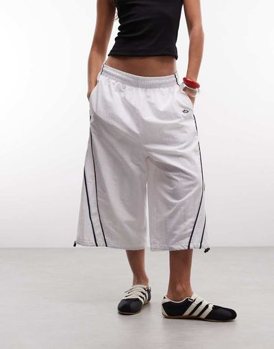 Collusion COLLUSION XL baggy longline nylon shorts in white