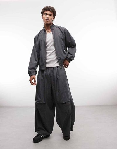 Collusion COLLUSION XL baggy track pants in black plaid