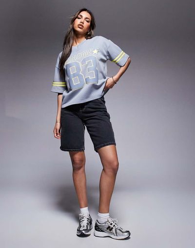 Courtside Courtside carpenter denim jorts with back pocket embroidery in washed black