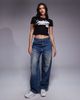 Courtside Courtside cropped baby t-shirt in washed black with collegiate logo print - 2
