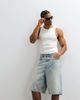 Courtside Courtside denim pearl embellished jorts in light wash blue - 1