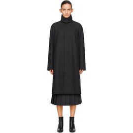 Dunst Dunst Body: 59% wool, 41% polyester. Lining: 100% polyester.