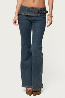 Edikted Edikted Asymmetric Grommet Belt Low Rise Flared Jeans in Blue/Vintage/Washed, Women's at Urban Outfitters