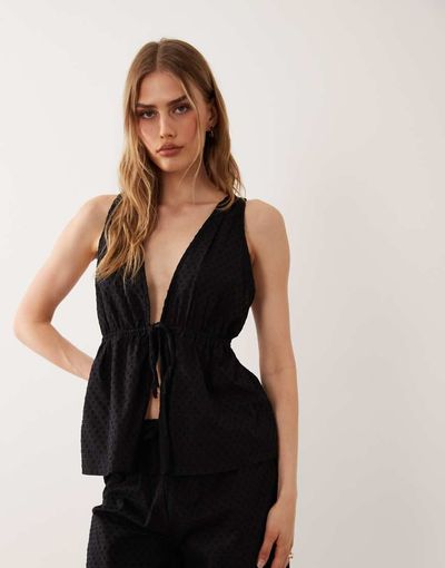 Esmée Esmée tie front textured detail beach top in black