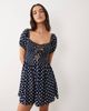 Esmée Esmee tie front puff sleeve mini beach dress in navy polka dot - 1