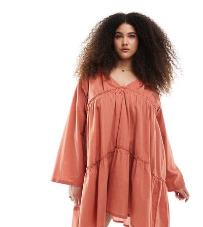 Esmee Curve Esmee Curve Exclusive tiered long sleeve mini beach dress in rust-Orange