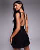 Fashionkilla Fashionkilla double sculpted slinky slash neck low back ruffle hem flower applique mini dress in black - 3