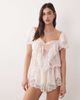 For Love & Lemons For Love & Lemons Grace lace hem bow detail romper in light pink - 1