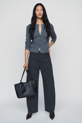 FRAME Bow High Rise Tapered Jeans
