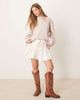Free People Free People roselle ruffled broderie mini skirt in ivory-White - 1