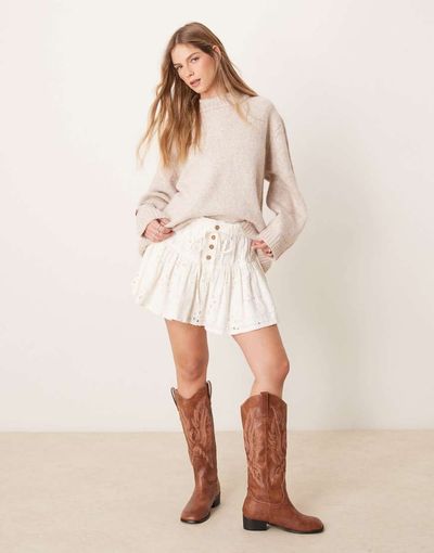 Free People Free People roselle ruffled broderie mini skirt in ivory-White