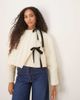 Ghospell Ghospell quilted cropped jacket with tie detailing in cream-White - 1