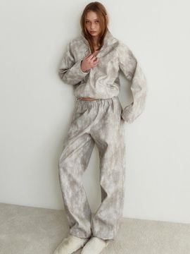 GIMMETHEYOUNG Rough Washed Double-Stitched Leather Pants