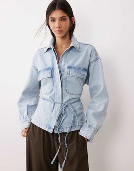 GINA TRICOT Gina Tricot cinched waist tie front denim shirt in lightwash blue