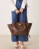 GINA TRICOT Gina Tricot faux leather medium tote bag with strap and clutch detail in dark brown - 1