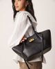 GINA TRICOT Gina Tricot faux leather small tote bag with strap and clutch with gold detail in black - 1