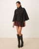 GINA TRICOT Gina Tricot funnel neck belted cape jacket in black - 1