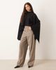 GINA TRICOT Gina Tricot knit cape sweater top in black - 1