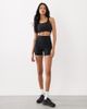 GINA TRICOT Gina Tricot mix and match cross-over back soft yoga sports bra top in black - 3
