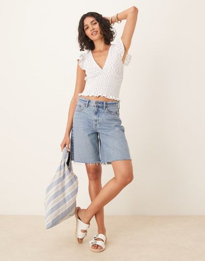 GINA TRICOT Gina Tricot short sleeve frill v neck top in white and blue print