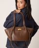 GINA TRICOT Gina Tricot small faux leather tote bag with strap and clutch detail in dark brown - 1