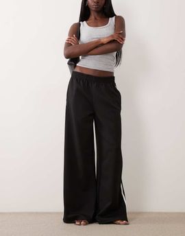 GINA TRICOT Gina Tricot sporty wide pants in black with white stripe