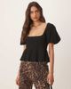 GINA TRICOT Gina Tricot wavy textured jersey with puff sleeves and peplum hem in black - 1
