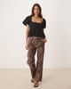GINA TRICOT Gina Tricot wavy textured jersey with puff sleeves and peplum hem in black - 2
