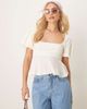 GINA TRICOT Gina Tricot wavy textured jersey with puff sleeves and peplum hem in ecru white - 1