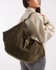 Glamorous Glamorous slouchy faux suede shoulder tote bag with metal buckle in khaki green - 1