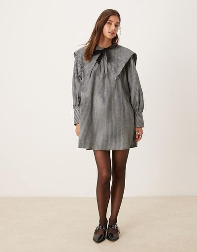 Glamorous Glamorous smock mini dress with dramatic collar and tie in black white check