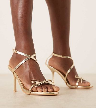 Glamorous Wide Fit Glamorous Wide Fit barely there heeled sandals with bow in gold