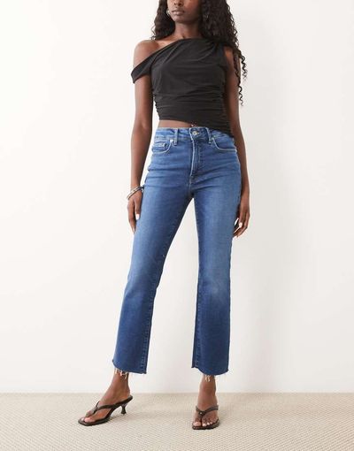 Good American Good American soft tech good legs slim straight leg jeans in mid blue wash
