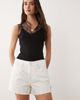 Good American Good American vintage mid rise longline denim shorts in white - 2