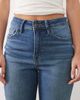 Good American Petite Good American Petite frayed hem flared jeans in mid blue wash - 4