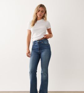 Good American Petite Good American Petite soft tech classic bootcut jeans in mid blue wash