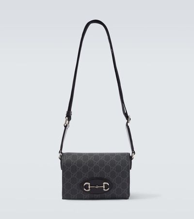 Gucci Gucci GG Supreme leather-trimmed canvas crossbody bag