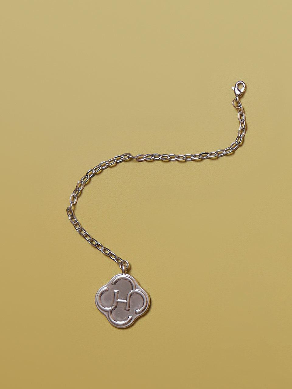 Heeari Vintage Matte Metal Logo Charm