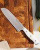 Henckels Henckels Forged Accent 7-inch Hollow Edge Santoku Knife in Stainless Steel at Urban Outfitters - 1
