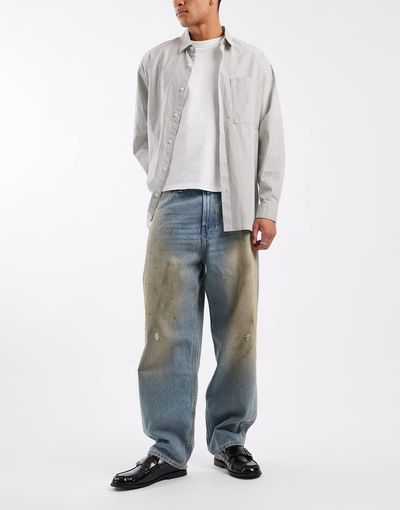 Hollister Hollister baggy skater jeans in grease stain mid blue wash